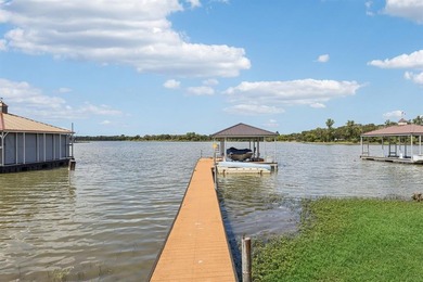 This beautifully maintained, one-owner home sits on just under on The Golf Club at Resort Eagle Mountain Lake in Texas - for sale on GolfHomes.com, golf home, golf lot