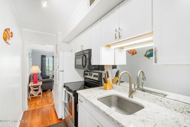 This exceptional resort style complex with it's abundance of on The Country Club of the Crystal Coast in North Carolina - for sale on GolfHomes.com, golf home, golf lot