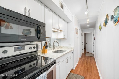 This exceptional resort style complex with it's abundance of on The Country Club of the Crystal Coast in North Carolina - for sale on GolfHomes.com, golf home, golf lot