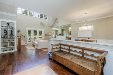 This custom home, set on an oversized homesite, offers 4 on Colleton River Plantation Club in South Carolina - for sale on GolfHomes.com, golf home, golf lot