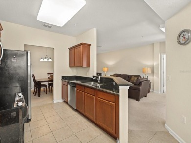 Step into effortless living with this fully furnished condo in on ChampionsGate Golf Resort in Florida - for sale on GolfHomes.com, golf home, golf lot