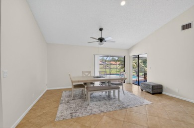 Open floor plan overlooking pool and golf course.  Besides the on Boca Greens Country Club in Florida - for sale on GolfHomes.com, golf home, golf lot