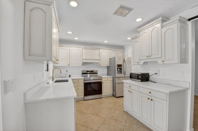 Open floor plan overlooking pool and golf course.  Besides the on Boca Greens Country Club in Florida - for sale on GolfHomes.com, golf home, golf lot