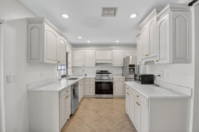 Open floor plan overlooking pool and golf course.  Besides the on Boca Greens Country Club in Florida - for sale on GolfHomes.com, golf home, golf lot