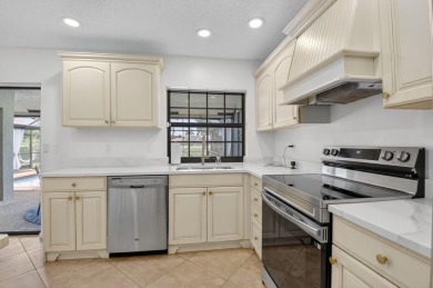 Open floor plan overlooking pool and golf course.  Besides the on Boca Greens Country Club in Florida - for sale on GolfHomes.com, golf home, golf lot