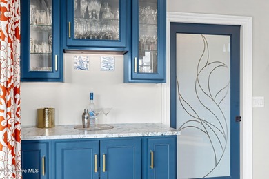 Experience the luxury of coastal living in this 4 bedroom, 4.5 on Compass Pointe Golf Course in North Carolina - for sale on GolfHomes.com, golf home, golf lot