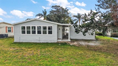 This GORGEOUS 2/2 home in Country Club Hills is a total on El Diablo Executive Golf Course in Florida - for sale on GolfHomes.com, golf home, golf lot