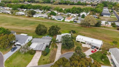 This GORGEOUS 2/2 home in Country Club Hills is a total on El Diablo Executive Golf Course in Florida - for sale on GolfHomes.com, golf home, golf lot