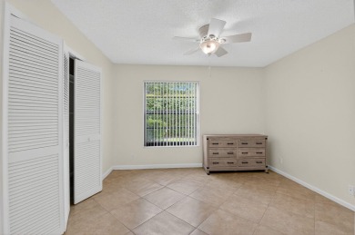Open floor plan overlooking pool and golf course.  Besides the on Boca Greens Country Club in Florida - for sale on GolfHomes.com, golf home, golf lot