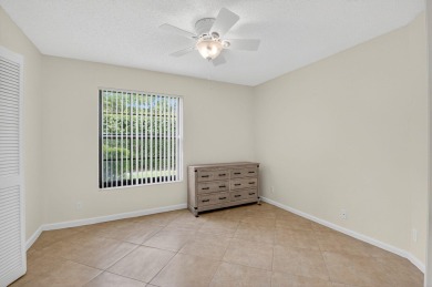 Open floor plan overlooking pool and golf course.  Besides the on Boca Greens Country Club in Florida - for sale on GolfHomes.com, golf home, golf lot