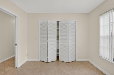 Open floor plan overlooking pool and golf course.  Besides the on Boca Greens Country Club in Florida - for sale on GolfHomes.com, golf home, golf lot
