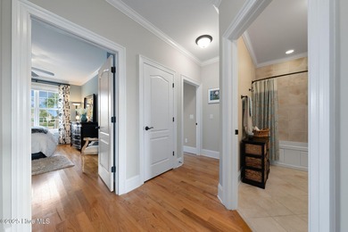 Experience the luxury of coastal living in this 4 bedroom, 4.5 on Compass Pointe Golf Course in North Carolina - for sale on GolfHomes.com, golf home, golf lot