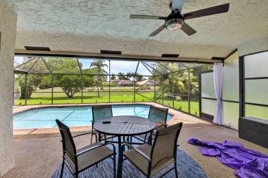 Open floor plan overlooking pool and golf course.  Besides the on Boca Greens Country Club in Florida - for sale on GolfHomes.com, golf home, golf lot