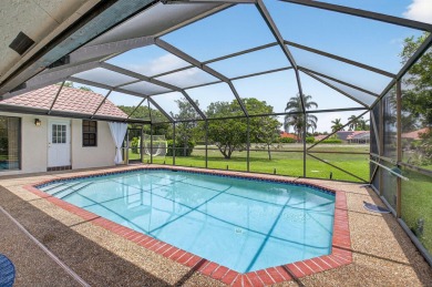 Open floor plan overlooking pool and golf course.  Besides the on Boca Greens Country Club in Florida - for sale on GolfHomes.com, golf home, golf lot