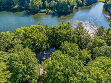 An exception opportunity with multiple, adjoining lakefront lots on Lake Toxaway Country Club in North Carolina - for sale on GolfHomes.com, golf home, golf lot