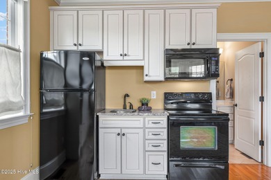 Experience the luxury of coastal living in this 4 bedroom, 4.5 on Compass Pointe Golf Course in North Carolina - for sale on GolfHomes.com, golf home, golf lot