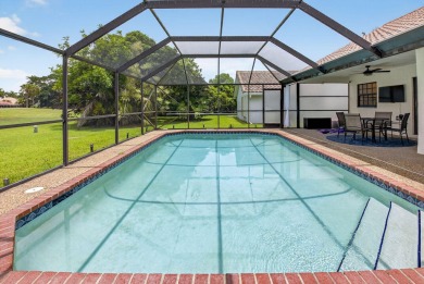 Open floor plan overlooking pool and golf course.  Besides the on Boca Greens Country Club in Florida - for sale on GolfHomes.com, golf home, golf lot