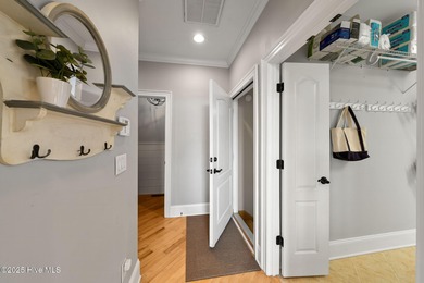 Experience the luxury of coastal living in this 4 bedroom, 4.5 on Compass Pointe Golf Course in North Carolina - for sale on GolfHomes.com, golf home, golf lot