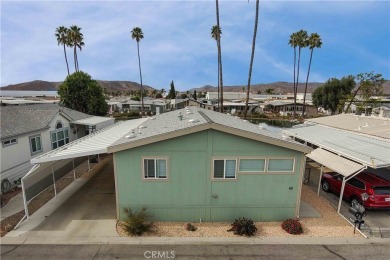 Welcome home to this beautiful NEW LAKEFRONT manufactured home on Hemet West Mobile Estates in California - for sale on GolfHomes.com, golf home, golf lot