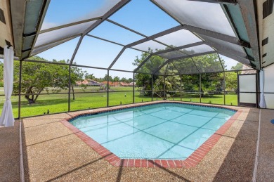 Open floor plan overlooking pool and golf course.  Besides the on Boca Greens Country Club in Florida - for sale on GolfHomes.com, golf home, golf lot
