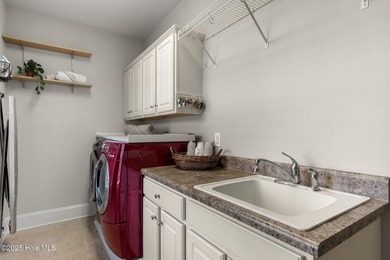 Experience the luxury of coastal living in this 4 bedroom, 4.5 on Compass Pointe Golf Course in North Carolina - for sale on GolfHomes.com, golf home, golf lot