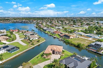 Custom-Built Waterfront Home with 307 Feet of Panoramic Water on Palmetto-Pine Country Club in Florida - for sale on GolfHomes.com, golf home, golf lot
