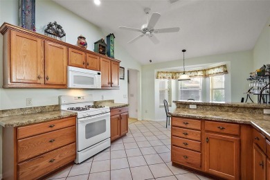 Nestled in the highly sought-after Village of Poinciana, this on The Links of Spruce Creek in Florida - for sale on GolfHomes.com, golf home, golf lot