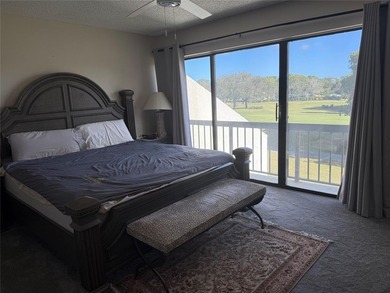 Beautiful upper level townhouse walking distance to the Club on Boca West Golf and Country Club in Florida - for sale on GolfHomes.com, golf home, golf lot