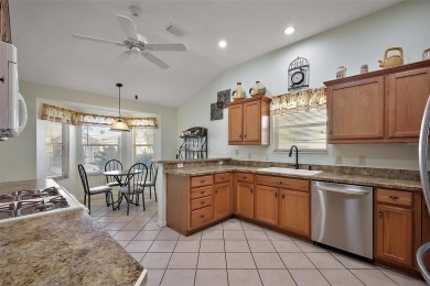 Nestled in the highly sought-after Village of Poinciana, this on The Links of Spruce Creek in Florida - for sale on GolfHomes.com, golf home, golf lot