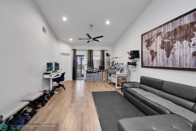 This beautifully and totally updated 2-bed, 2-bath townhouse on Woodmont Country Club in Florida - for sale on GolfHomes.com, golf home, golf lot