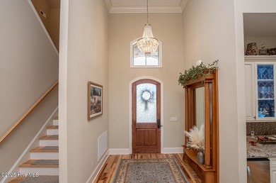 Stunning one-of-a-kind custom stone beauty with pond/golf course on Ocean Ridge Plantation in North Carolina - for sale on GolfHomes.com, golf home, golf lot