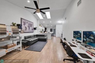 This beautifully and totally updated 2-bed, 2-bath townhouse on Woodmont Country Club in Florida - for sale on GolfHomes.com, golf home, golf lot