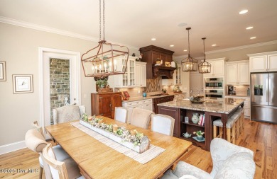 Incredible attention to detail in this custom stone beauty on Ocean Ridge Plantation in North Carolina - for sale on GolfHomes.com, golf home, golf lot