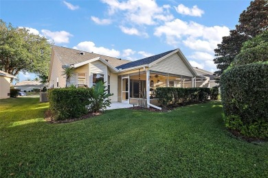 Nestled in the highly sought-after Village of Poinciana, this on The Links of Spruce Creek in Florida - for sale on GolfHomes.com, golf home, golf lot