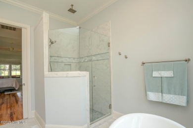 Incredible attention to detail in this custom stone beauty on Ocean Ridge Plantation in North Carolina - for sale on GolfHomes.com, golf home, golf lot