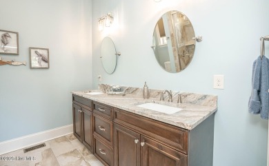 Incredible attention to detail in this custom stone beauty on Ocean Ridge Plantation in North Carolina - for sale on GolfHomes.com, golf home, golf lot