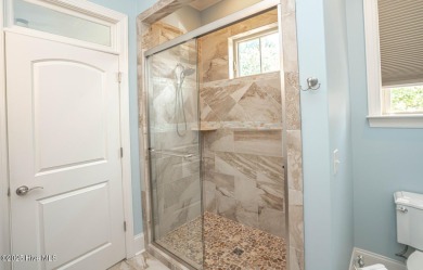Incredible attention to detail in this custom stone beauty on Ocean Ridge Plantation in North Carolina - for sale on GolfHomes.com, golf home, golf lot