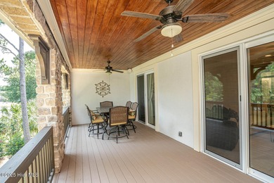 Stunning one-of-a-kind custom stone beauty with pond/golf course on Ocean Ridge Plantation in North Carolina - for sale on GolfHomes.com, golf home, golf lot