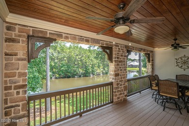 Stunning one-of-a-kind custom stone beauty with pond/golf course on Ocean Ridge Plantation in North Carolina - for sale on GolfHomes.com, golf home, golf lot