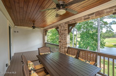 Stunning one-of-a-kind custom stone beauty with pond/golf course on Ocean Ridge Plantation in North Carolina - for sale on GolfHomes.com, golf home, golf lot