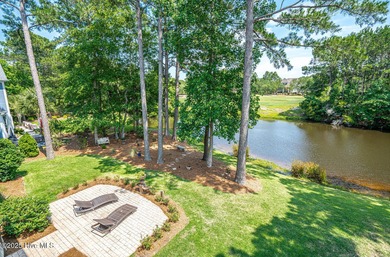 Stunning one-of-a-kind custom stone beauty with pond/golf course on Ocean Ridge Plantation in North Carolina - for sale on GolfHomes.com, golf home, golf lot