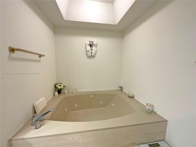 Experience luxury living with million-dollar views in this on Turnberry Isle Resort and Club in Florida - for sale on GolfHomes.com, golf home, golf lot