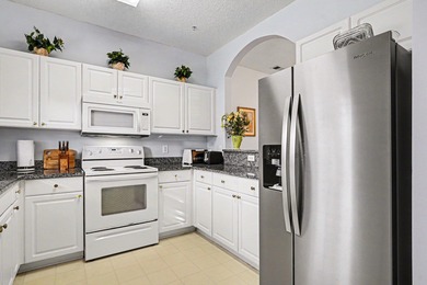 Welcome to this two-bedroom, two-bathroom first-floor condo in on Barefoot Resort and Golf Club  in South Carolina - for sale on GolfHomes.com, golf home, golf lot