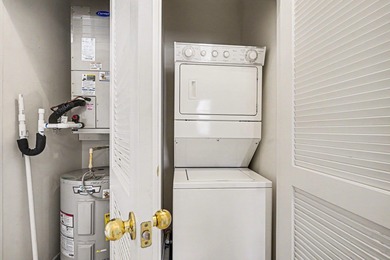 Welcome to this two-bedroom, two-bathroom first-floor condo in on Barefoot Resort and Golf Club  in South Carolina - for sale on GolfHomes.com, golf home, golf lot