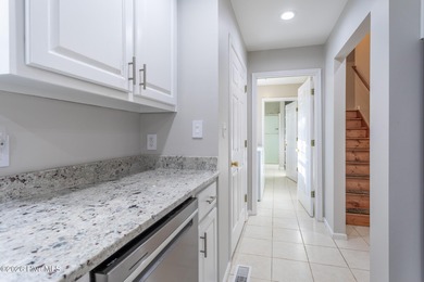 Welcome to 147 Pee Dee Drive in the highly sought-after gated on Sound Golf Links at Albemarle Plantation in North Carolina - for sale on GolfHomes.com, golf home, golf lot