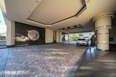 Experience luxury living with million-dollar views in this on Turnberry Isle Resort and Club in Florida - for sale on GolfHomes.com, golf home, golf lot