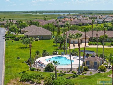 Selling furnished & move-in ready, this lakefront home in the on South Padre Island Golf Club in Texas - for sale on GolfHomes.com, golf home, golf lot