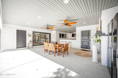 Completely Updated Coastal Retreat in the Heart of Ocean Springs on Gulf Hills Golf Club in Mississippi - for sale on GolfHomes.com, golf home, golf lot