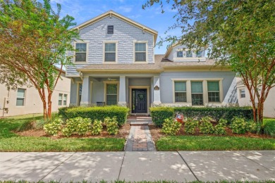 Welcome home to your stunning front porch LAKE VIEWS, on this on Orange County National Golf Center and Lodge in Florida - for sale on GolfHomes.com, golf home, golf lot