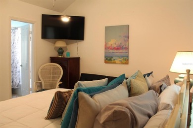 Welcome to this charming 2-bedroom, 2.5-bath condominium located on Errol Estates Country Club in Florida - for sale on GolfHomes.com, golf home, golf lot